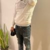 A man wearing a SoulieLove Collections jacket