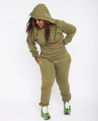 A woman wearing a SoulieLove Collections tracksuit